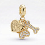 Charm Huella Hueso Corazón Dorado Rodinado