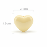 Dije Pasador Corazón Liso amarillo pastel 1.8 cm Acrílico