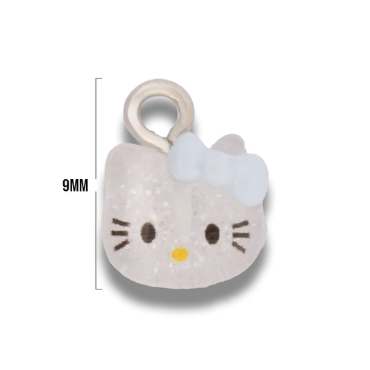 Dije Acrílico Hello Kitty Carita Transparente Moño Azul