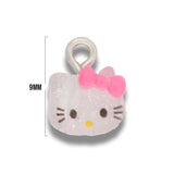 Dije Acrílico Hello Kitty Carita Transparente Moño Rosa