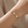 Pulsera Ajustable Tréboles Blanco Circones Dorado Rodinado